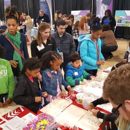 Tracy Shandor engineering volunteer with kids in stem