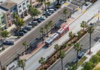 Aerial view of a Rapid bus stopped at a bus station