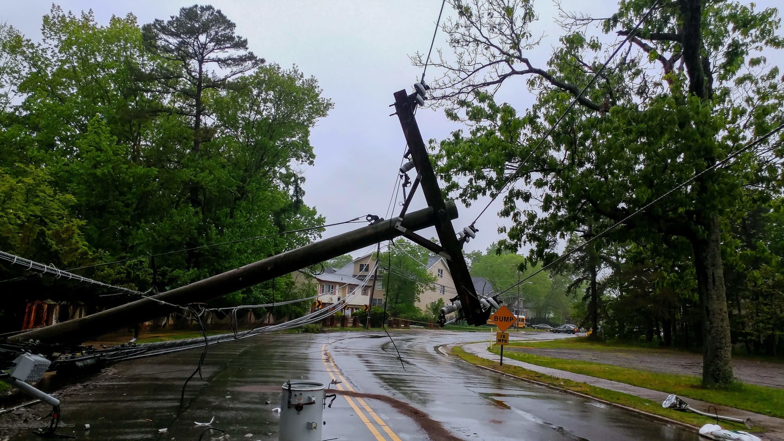 Downed power lines laying across a residential street