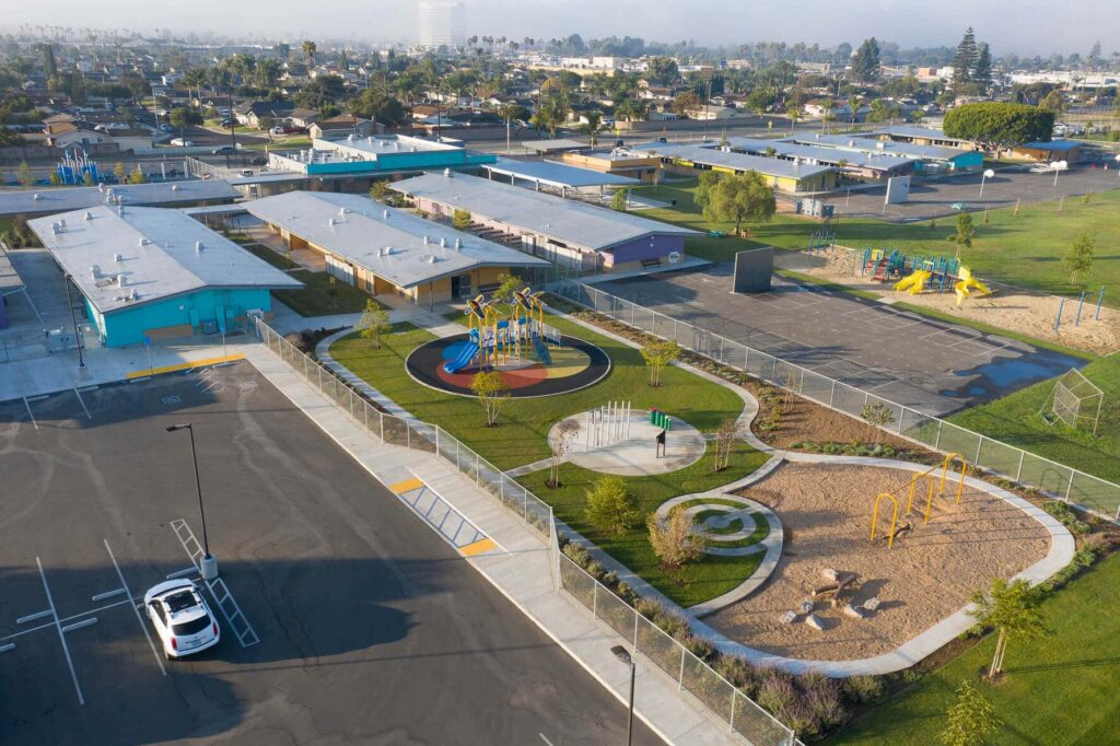 Aerial view of the back of Westmont Elementary school showing the school's playground and outdoor learning areas