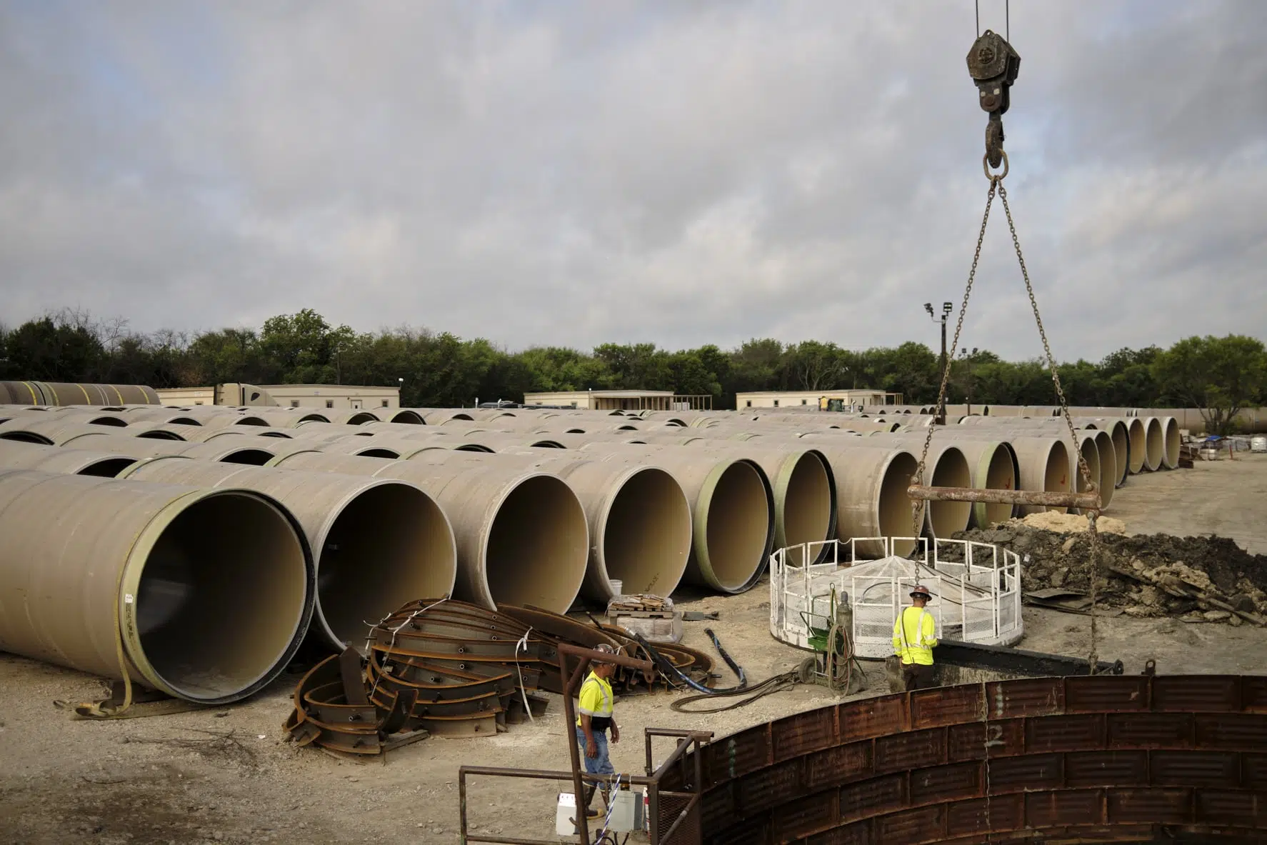 A row of pipes on a job site