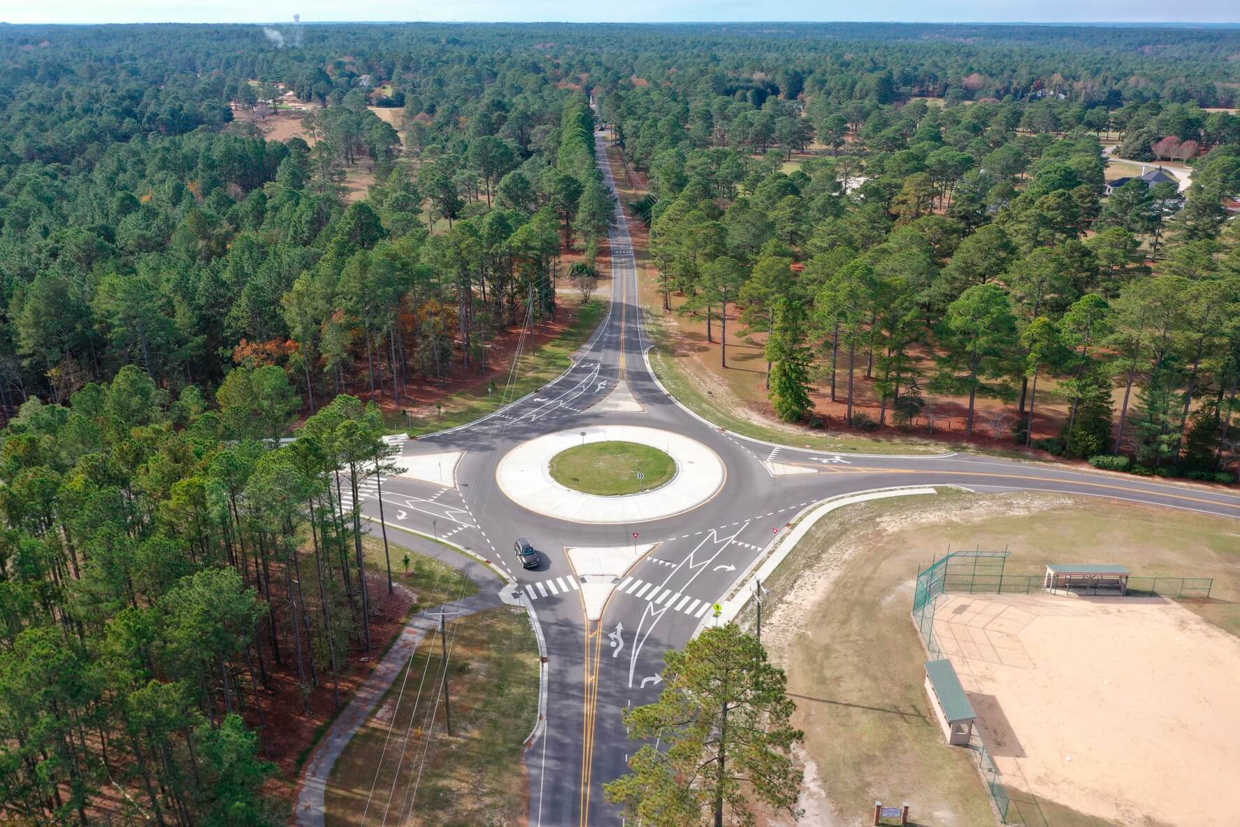 Arial view of the Moore County Roundabout with 4 outlets.